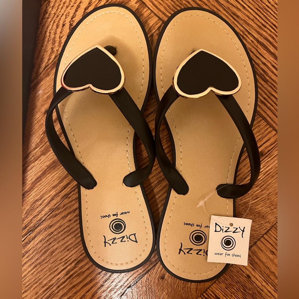 Dizzy black and gold heart flip flop sandals